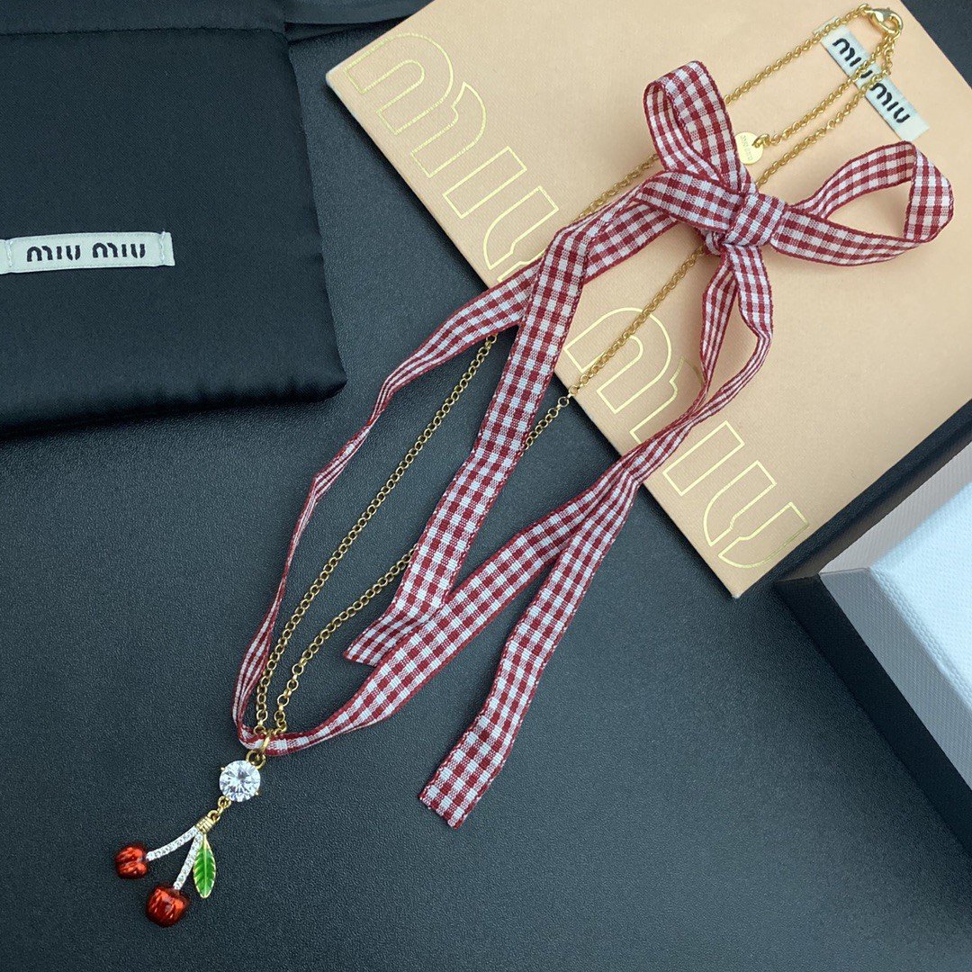 Miu Miu Beaded Necklace: Colorful Glass Beads with Gold Spacers 3 Miu Miu Beaded Necklace: Colorful Glass Beads with Gold Spacers - Image 3