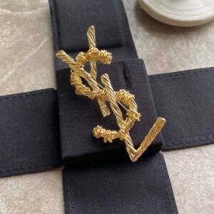 YSL Art Deco Brooch: Geometric Patterns with Onyx & Mother of Pearl