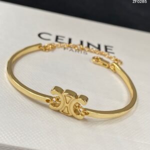 Celine Triomphe Signature Bracelet: Embossed Leather & Metal Adjustable Cuff