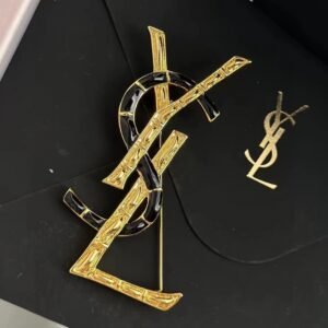 YSL Geometric Monogram Brooch: Abstract Cassandre Design in Silver