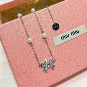 Miu Miu Tulle Bow Necklace: Oversized Translucent Bow with Crystal Center