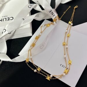 Celine Bamboo Necklace: Natural Material with Gold Clasp