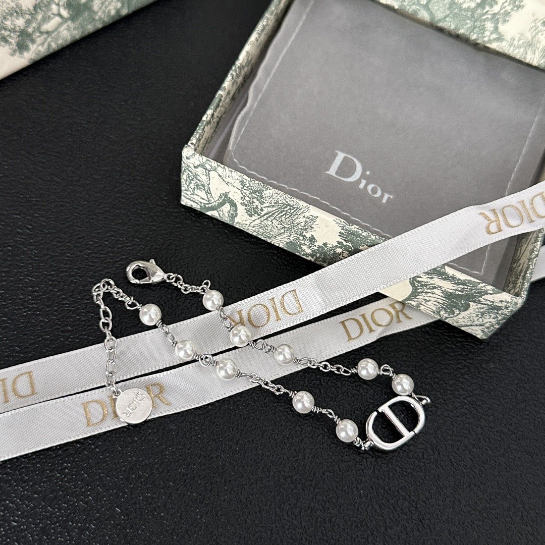 Dior New Bracelet Stacking Set: Curated Mix of Thin Chains & Charms 4 Dior New Bracelet Stacking Set: Curated Mix of Thin Chains & Charms - Image 4