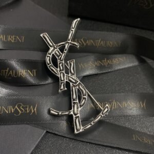 YSL Crystal Mesh Brooch: Flexible Pavé Panel with Signature Shape