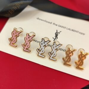 YSL Oversized Crescent Moon Earrings: Polished Gold with Textured Surface