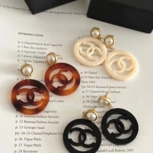 Chanel Dentelle de Calais Earrings: Fine Leavers Lace Pattern Cast in Metal