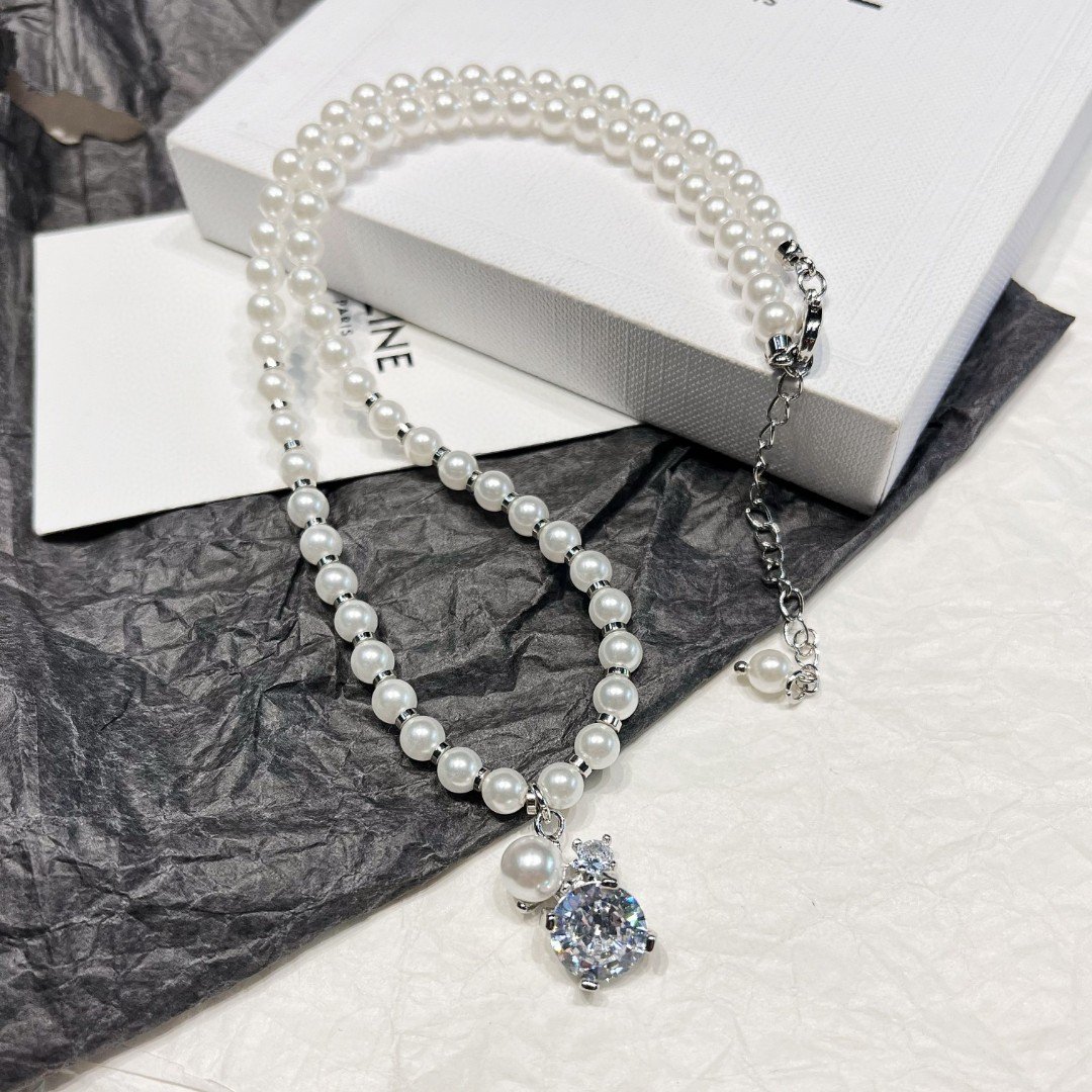 Celine Moon Phase Necklace: Celestial Motif with Crystal Accents 3 Celine Moon Phase Necklace: Celestial Motif with Crystal Accents - Image 3