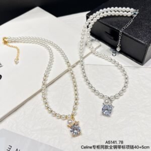 Celine Moon Phase Necklace: Celestial Motif with Crystal Accents