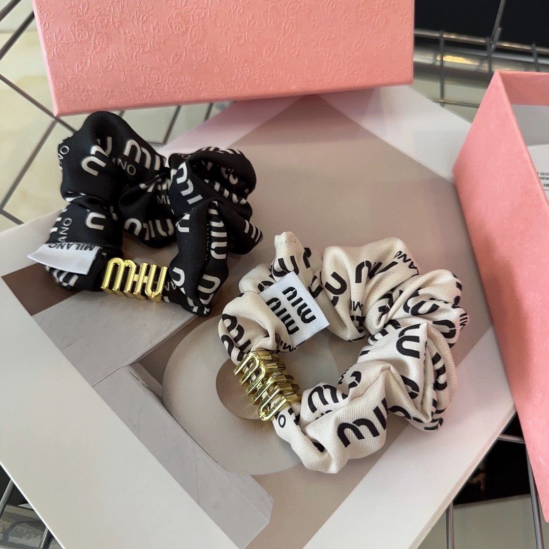 Miu Miu Ribbon-Knot Hair Tie: Double-Sided Satin with Hidden Elastic Core 1 Miu Miu Ribbon-Knot Hair Tie: Double-Sided Satin with Hidden Elastic Core