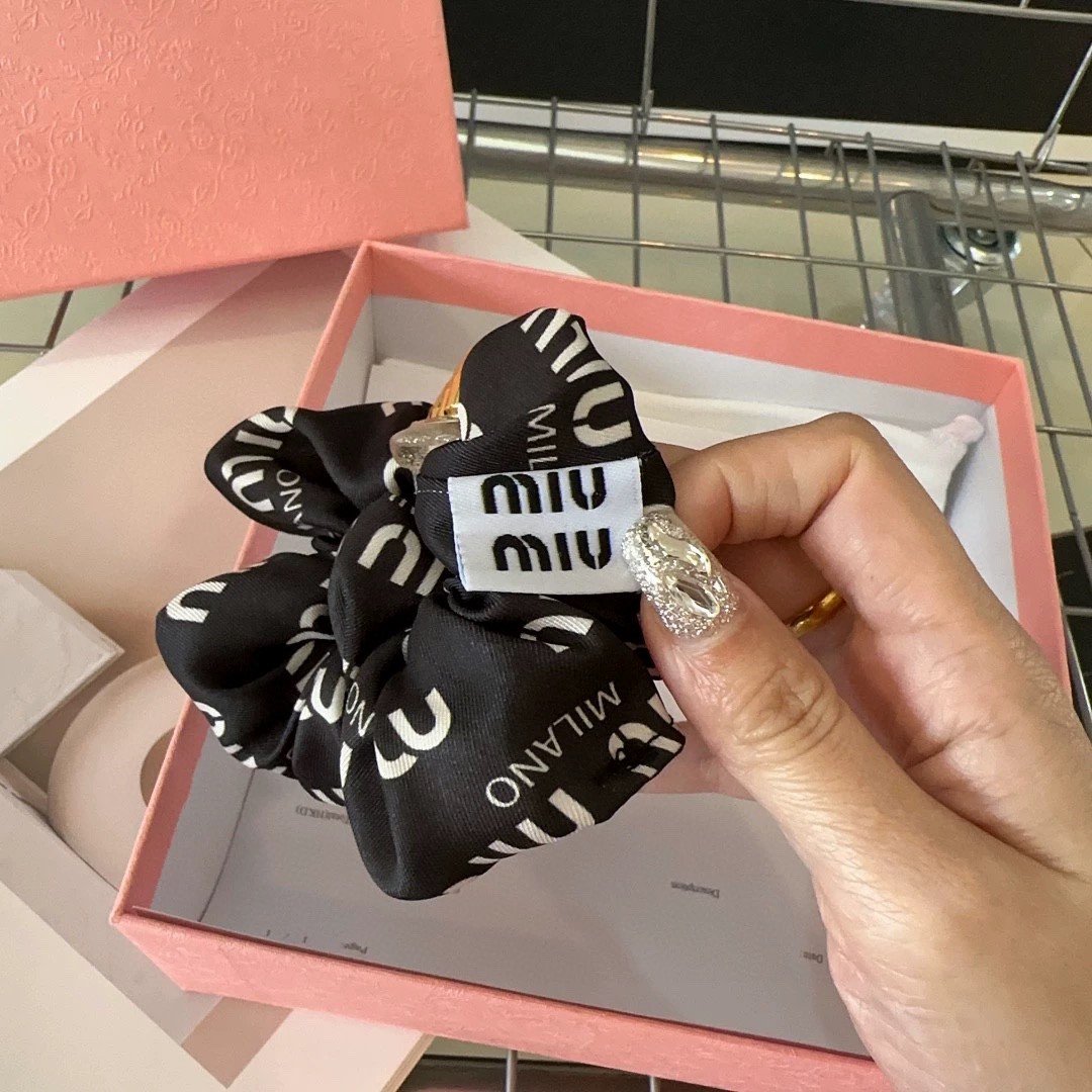 Miu Miu Ribbon-Knot Hair Tie: Double-Sided Satin with Hidden Elastic Core 5 Miu Miu Ribbon-Knot Hair Tie: Double-Sided Satin with Hidden Elastic Core - Image 5