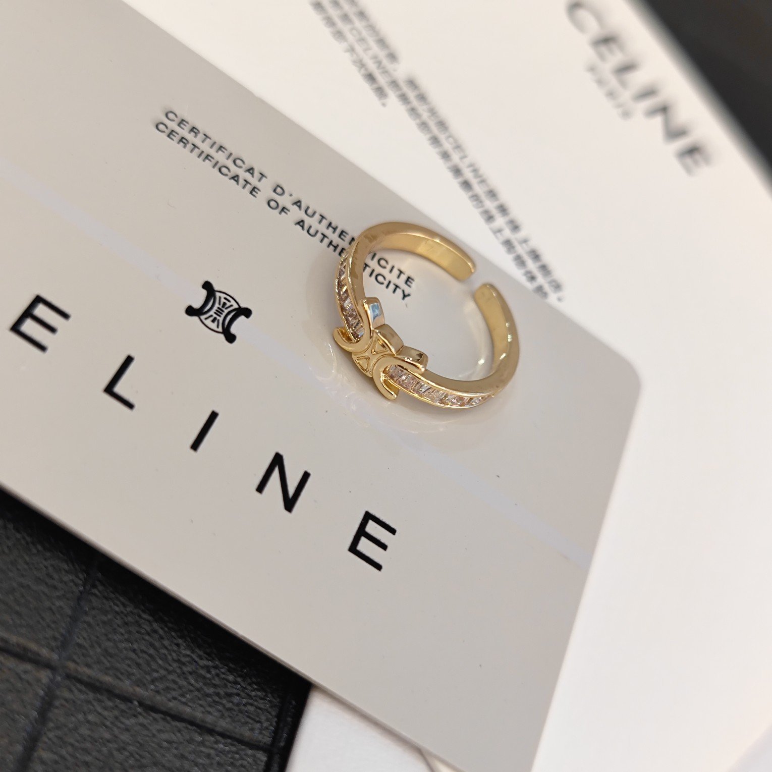Celine Celestial Ring New: Star & Moon Motif with Pavé Crystal Details 1 Celine Celestial Ring New: Star & Moon Motif with Pavé Crystal Details