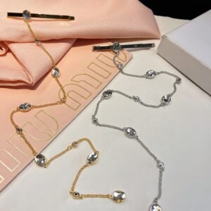 Miu Miu Pearl Rope Necklace: Long Strand with Decorative Clasp