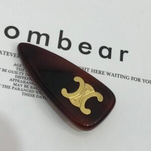 Celine New Triomphe Logo Hair Clip 2026: Polished Gold Metal Barrette