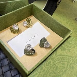 Gucci Architectural Drop Earrings: Structural Forms in Polished Brass