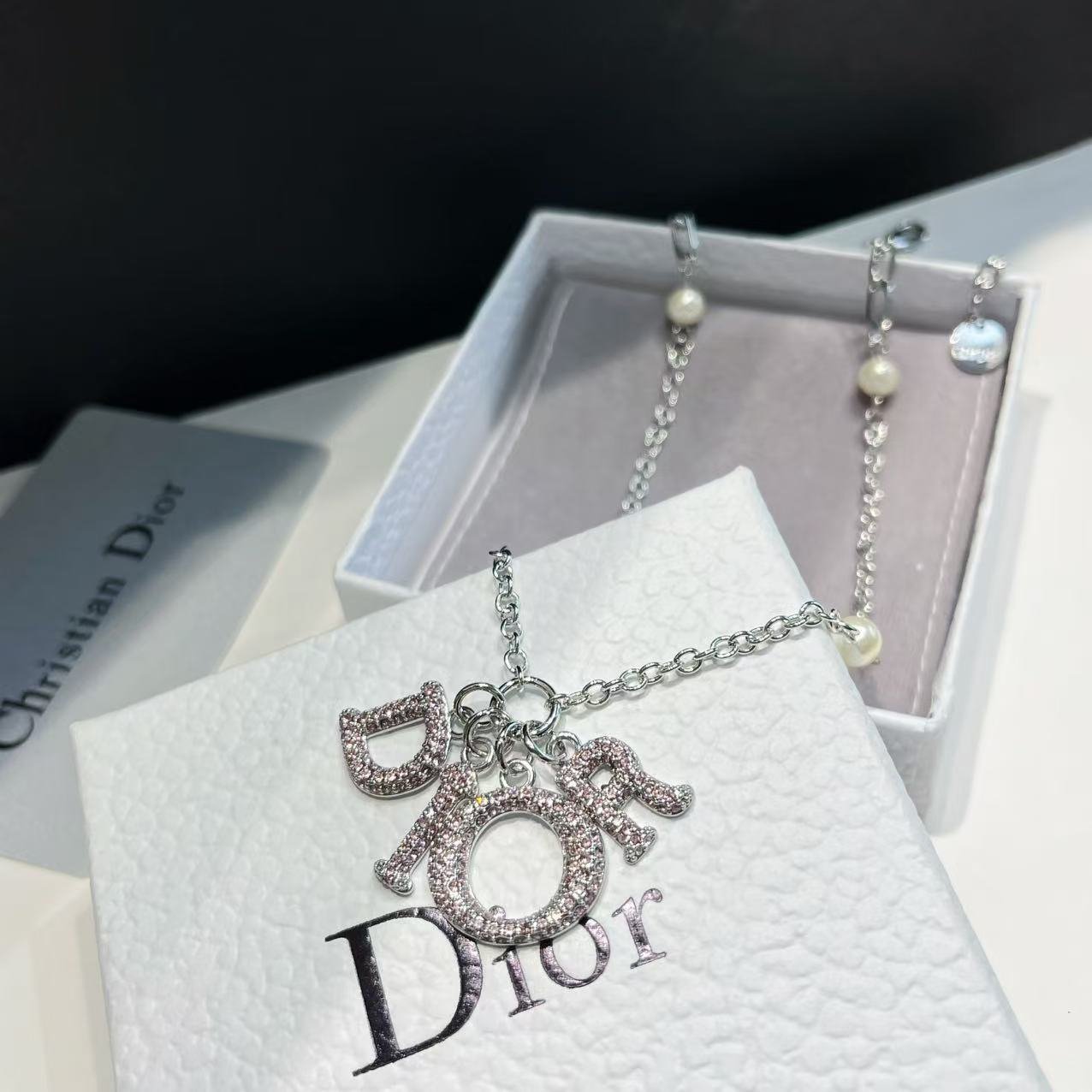 Dior Oblique Pattern Necklace: New Logo Designs 4 Dior Oblique Pattern Necklace: New Logo Designs - Image 4