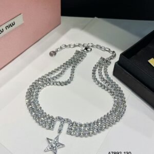 Miu Miu Modern Cross Pendant: Asymmetric Design with Micro Pearls