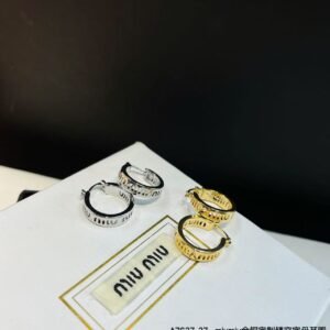 Miu Miu Geometric Drop Earrings: Angular Shapes with Smooth Edges