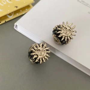 DIOR Révolutions Perforated Hoops: Geometric Cut-Outs in Yellow Gold