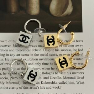 New Chanel Camellia Stud Earrings: Signature Flower in Enamel & Pearl