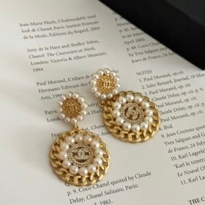 Chanel Infini de Camélia Earrings: Camellia with Infinitely Looping Petals in Wire