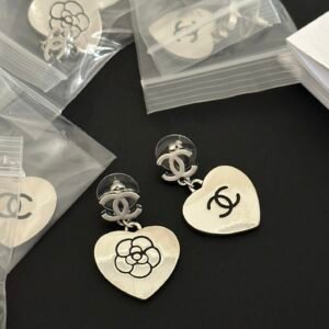 Chanel Édition Soie Blanchie Earrings: Undyed Raw Silk Knots with Pearl Terminals