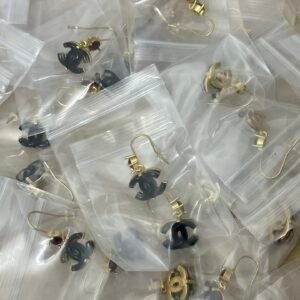 Chanel Lava Rock & Gold Earrings: Porous Black Lava Stone Contrasted with Gold