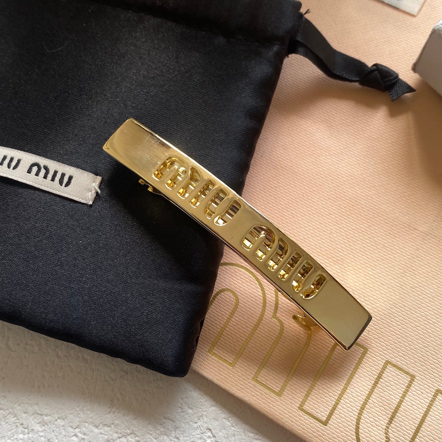 Miu Miu Double-Claw Clip: Pearlescent Finish with Hidden Logo 8 Miu Miu Double-Claw Clip: Pearlescent Finish with Hidden Logo - Image 8