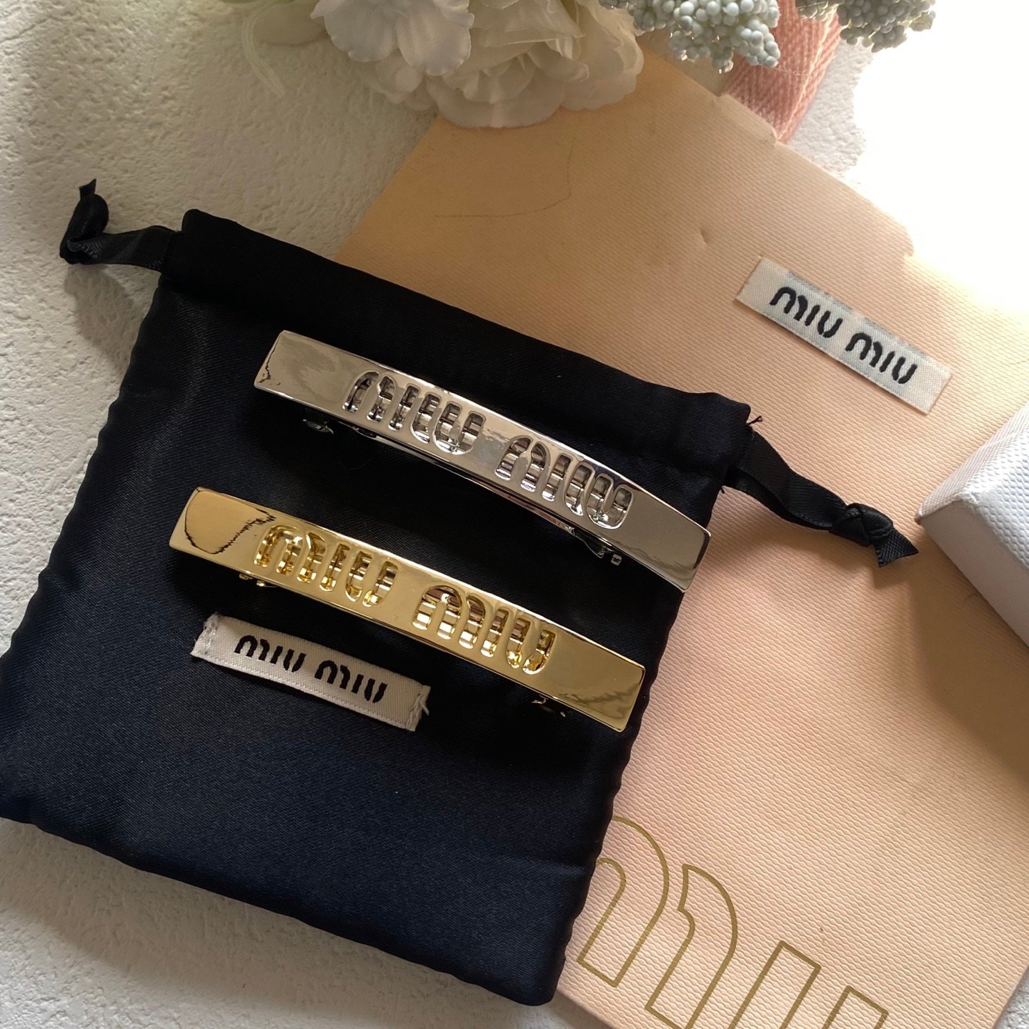 Miu Miu Double-Claw Clip: Pearlescent Finish with Hidden Logo 2 Miu Miu Double-Claw Clip: Pearlescent Finish with Hidden Logo - Image 2