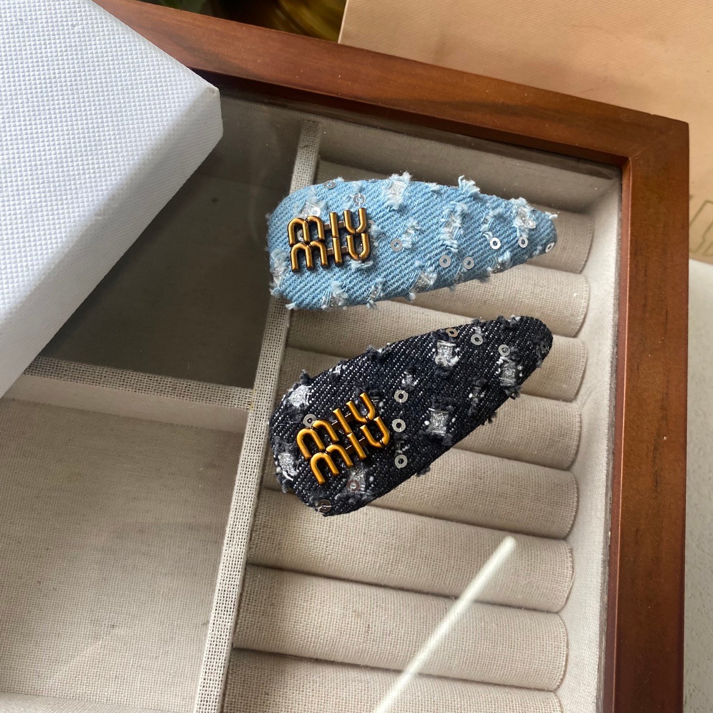 Miu Miu Velvet Butterfly Clip: Embossed Wings with Micro Crystal Details 1 Miu Miu Velvet Butterfly Clip: Embossed Wings with Micro Crystal Details