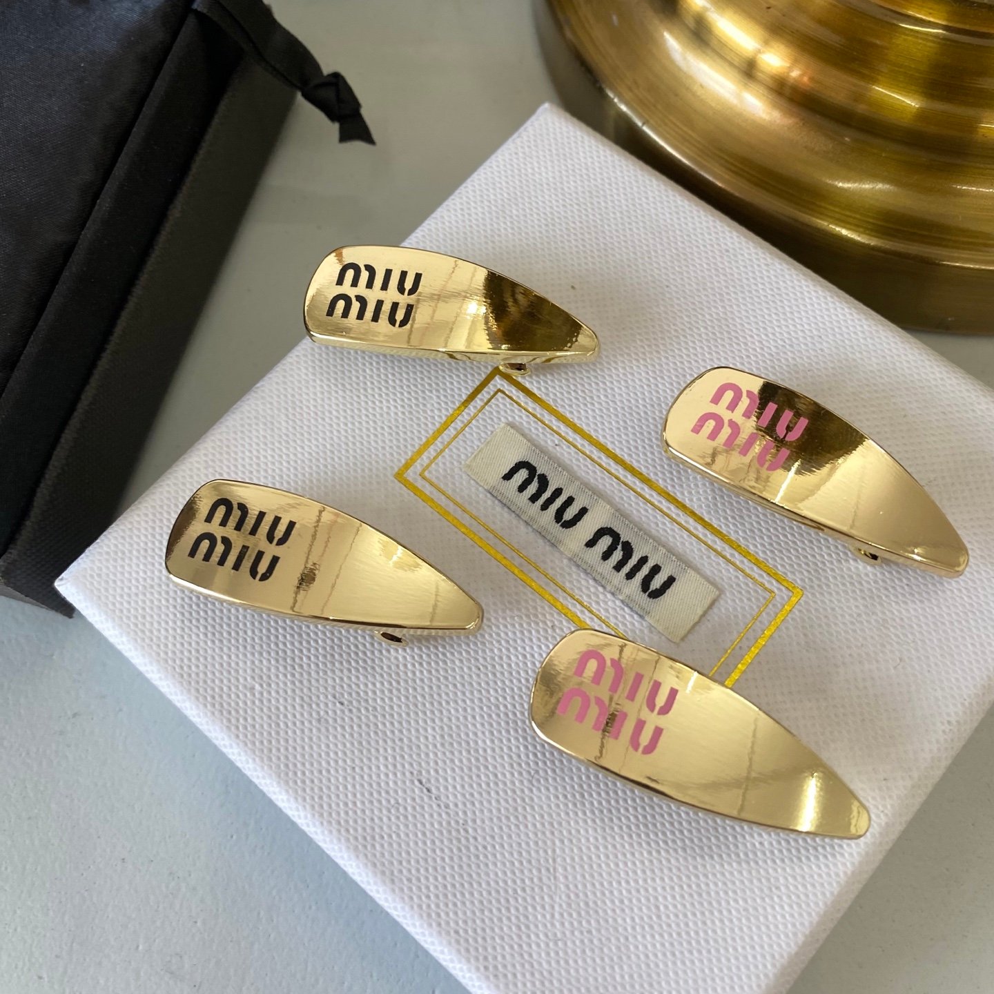 Miu Miu Floral Resin Hair Clip: Translucent Petals with Gold Wire Stem 1 Miu Miu Floral Resin Hair Clip: Translucent Petals with Gold Wire Stem