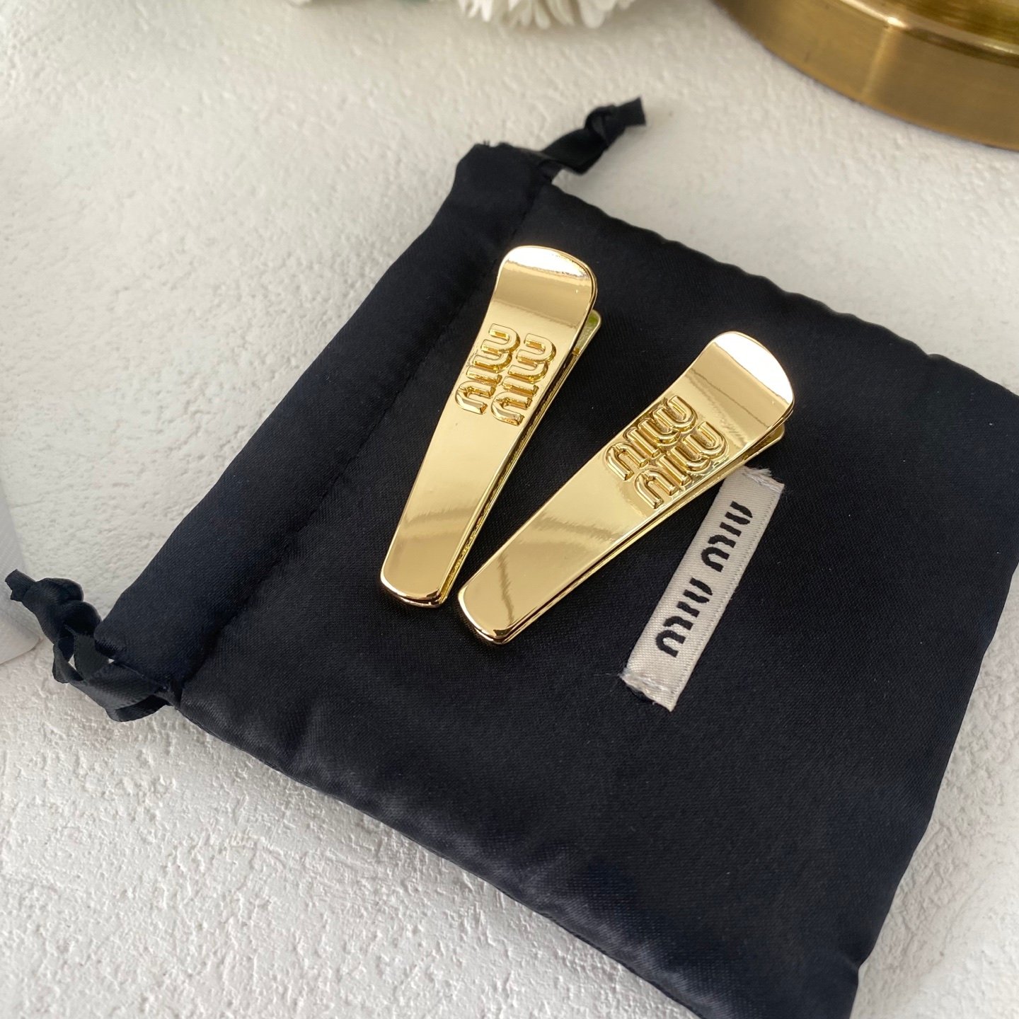 Miu Miu Matelassé Leather Hair Pin: Quilted Pattern with Mini Logo Charm 1 Miu Miu Matelassé Leather Hair Pin: Quilted Pattern with Mini Logo Charm